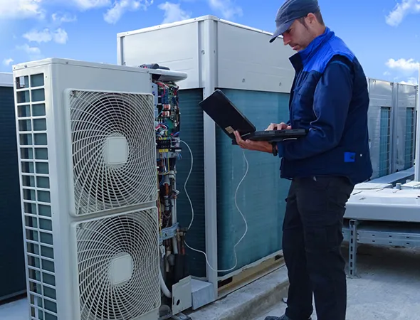 Seasonal HVAC tune-up in progress for a Millington business to prepare for changing Tennessee weather.