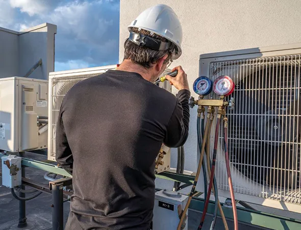 Certified installer completing reliable new heater setup in a Collierville, TN home.